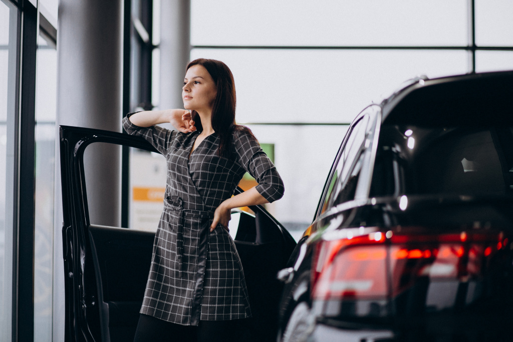 young-woman-car-showroom-choosing-car.jpg young-woman-car-showroom-choosing-car.jpg